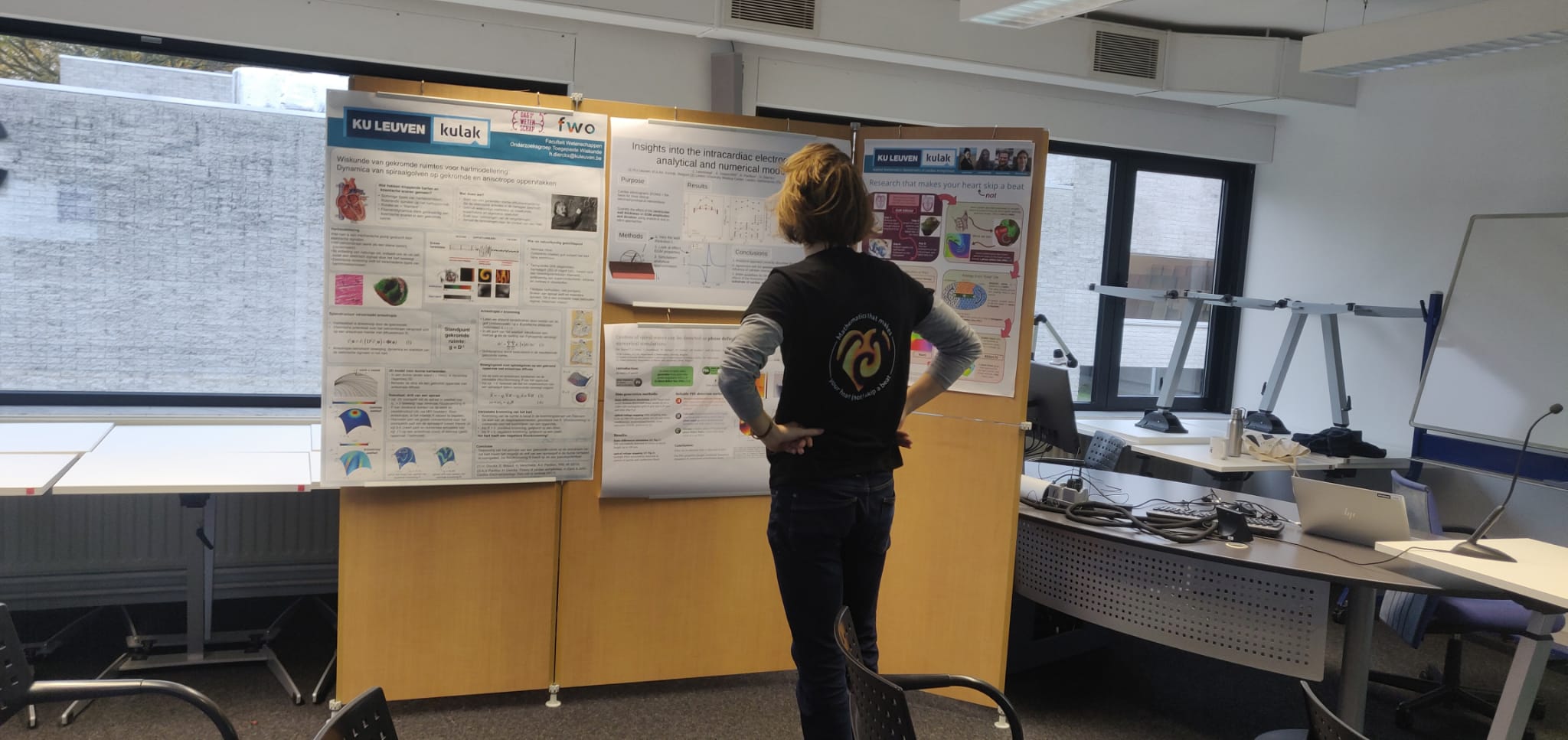Nathan studying the poster.